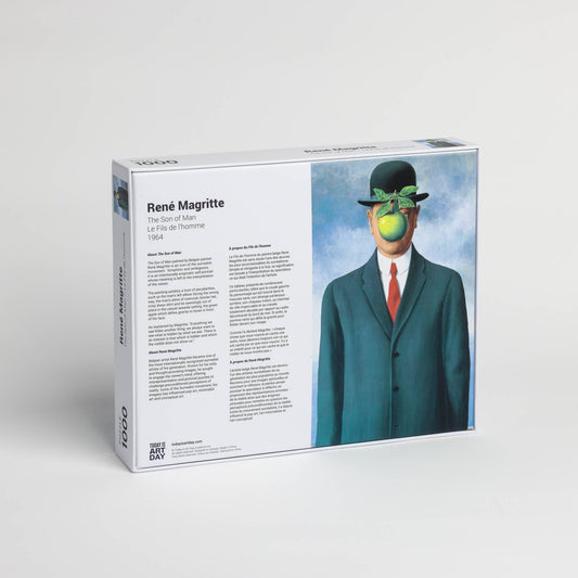 René Magritte Son of Man 1000-piece jigsaw puzzle featuring the suited man with an apple covering his face.