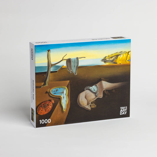 1000-piece puzzle featuring Salvador Dali’s artwork “Persistence of Memory” with melting clocks.