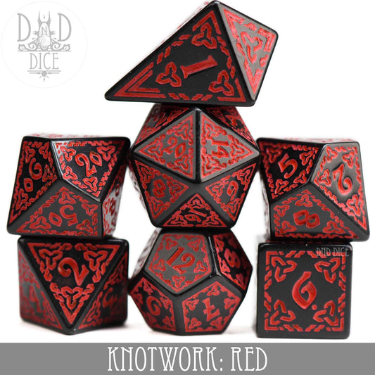 Knotwork: Red—set of 7 black acrylic dice with red knotwork designs and a teardrop-shaped D4.