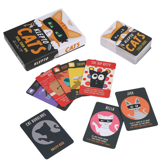 Klepto Cats card game set including box, rulebook, and cat burglar-themed cards.