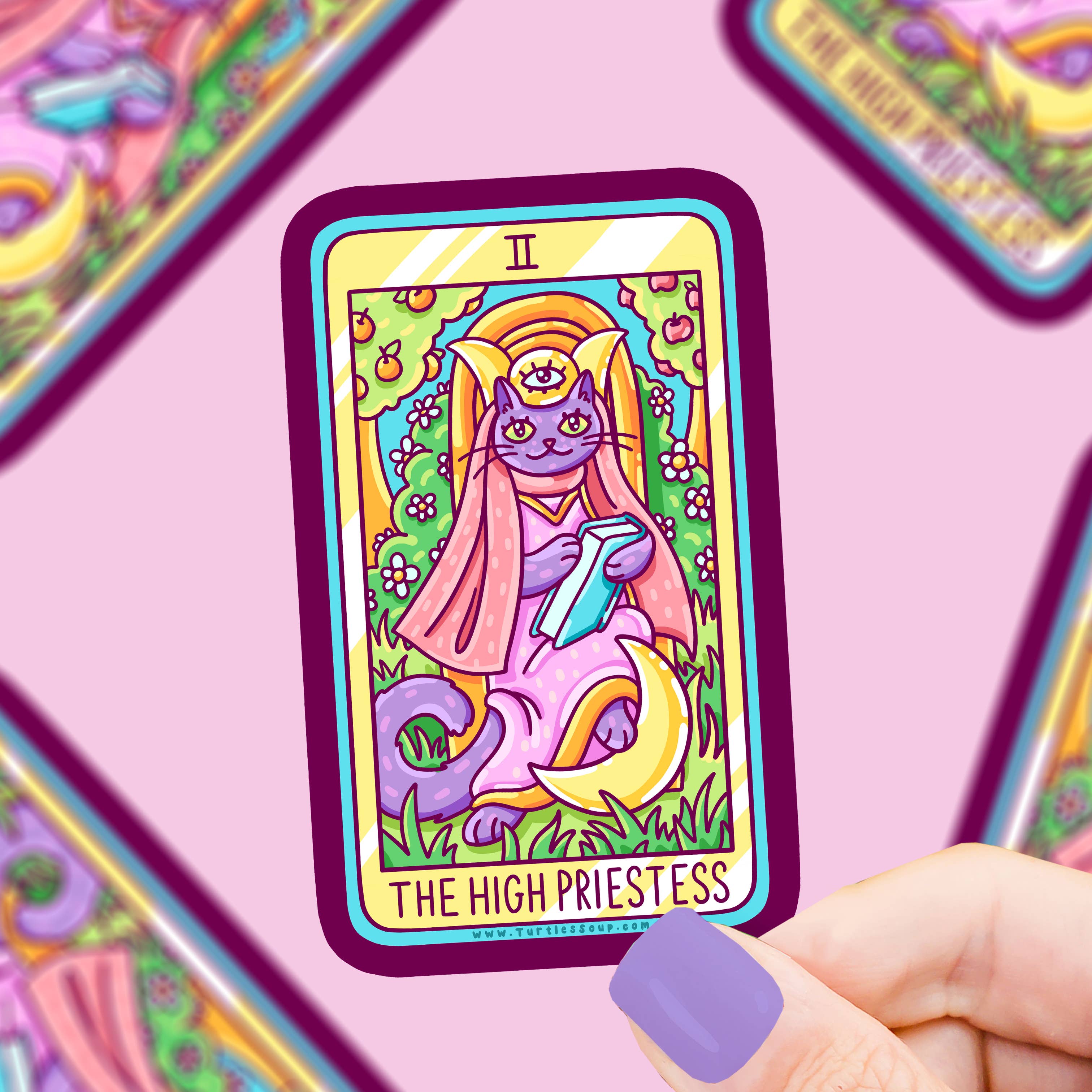 High Priestess Cat Major Arcana Tarot Card Vinyl Sticker featuring a purple cat in a floral tarot design held by a hand.
