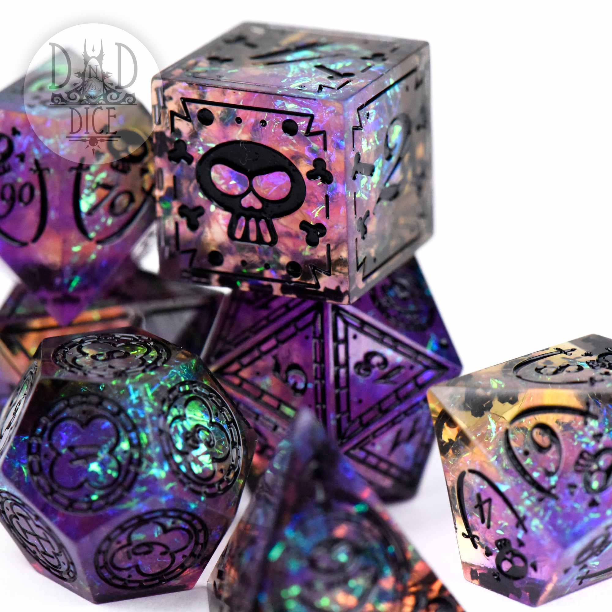 Black Beards Blight handmade iridescent resin dice with black heart, skull, and shield designs.