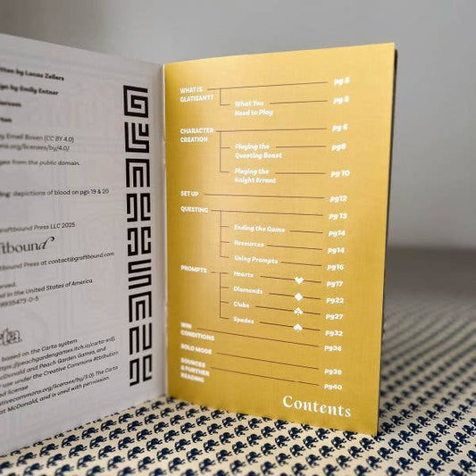 Open Glatisant solo journaling game booklet showing a table of contents with chapter titles and page numbers.
