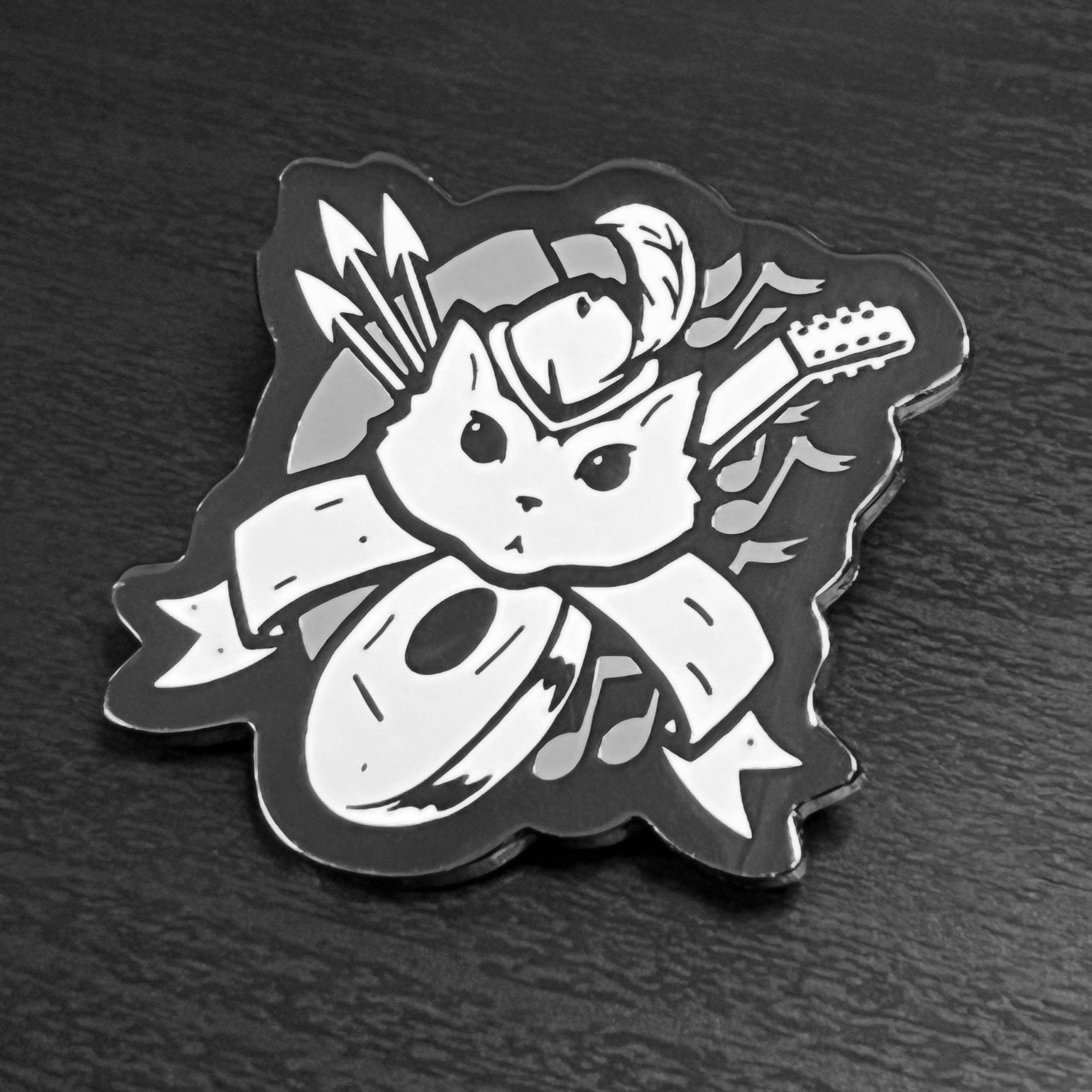 Bard enamel pin featuring a cat in a hat with arrows, guitar, record, and notes; hard enamel, black nickel plating.