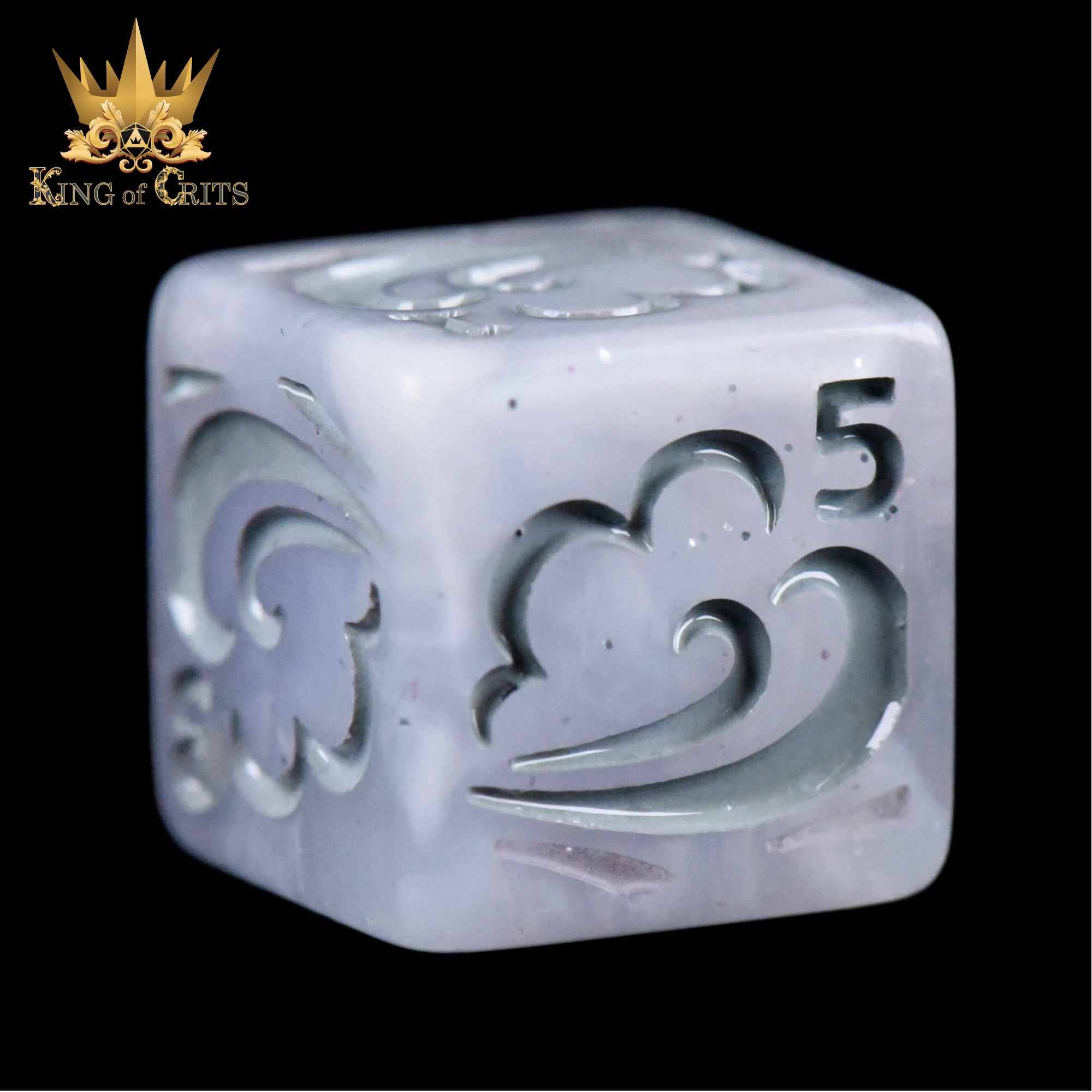 Pale purple resin die from the Forces of Nature 4D6 Set featuring cloud designs, a logo, and the number 5.