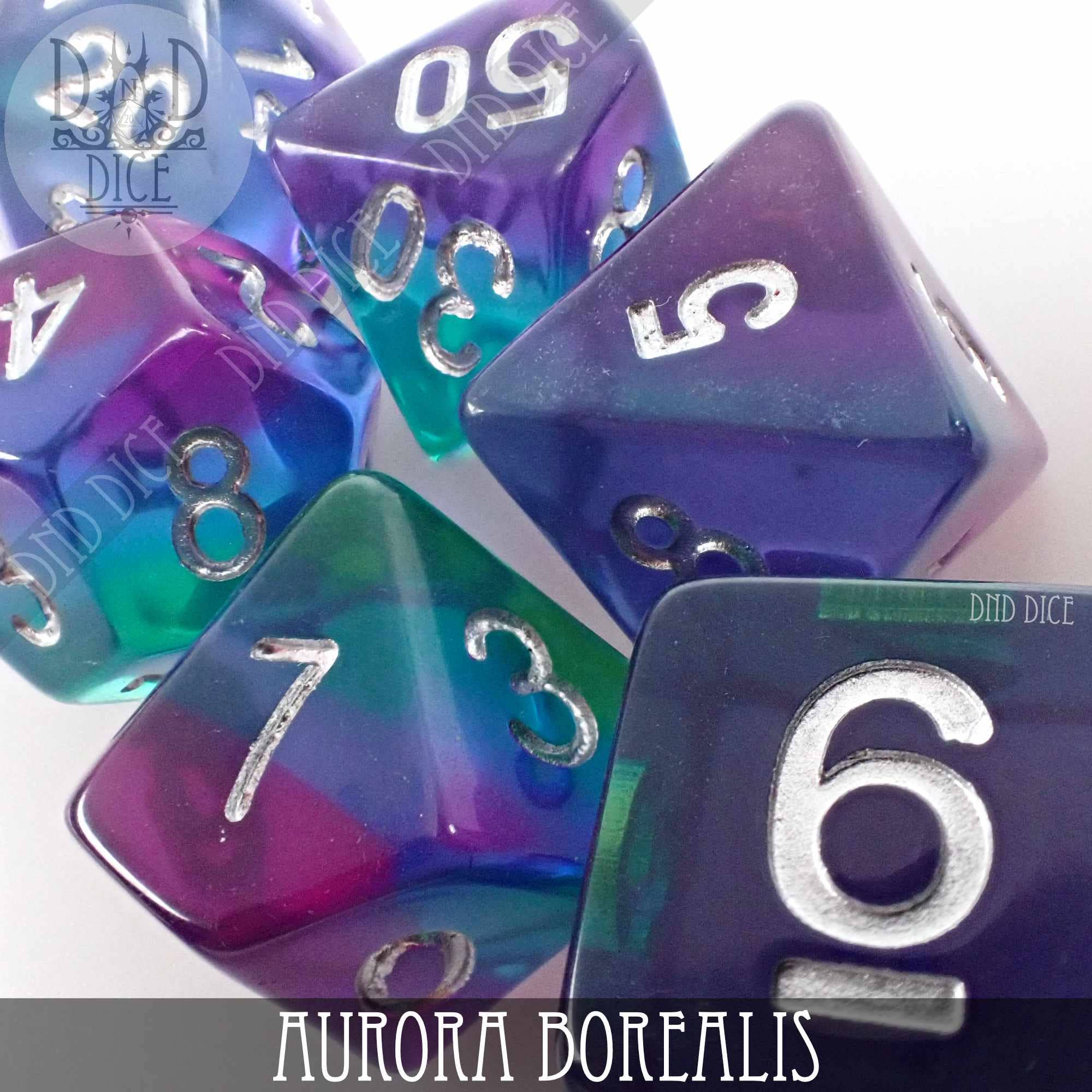 Aurora Borealis 7-piece translucent resin dice set with silver numbers.