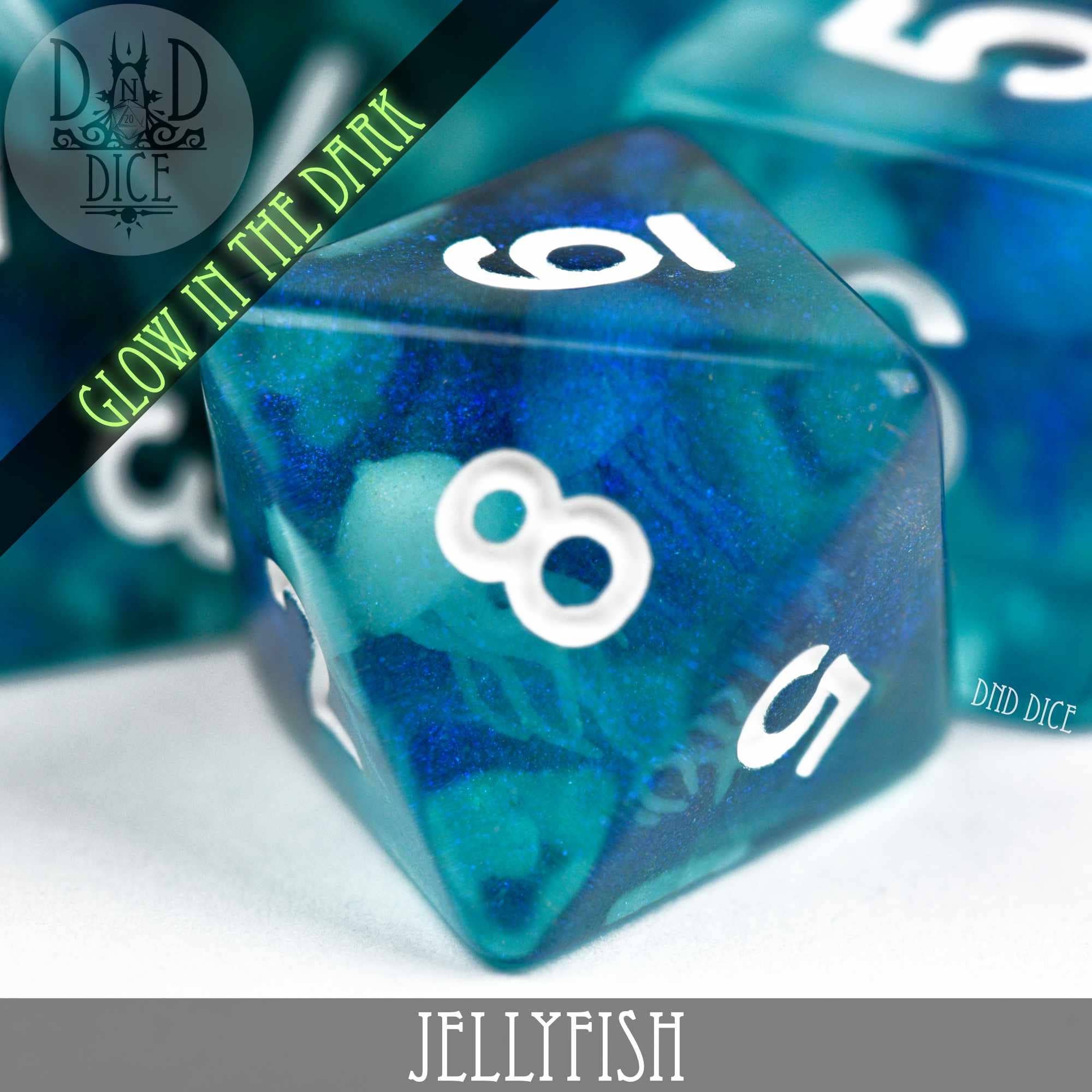 Blue glow-in-the-dark resin die from the Jellyfish (Glow) dice set for tabletop gaming.