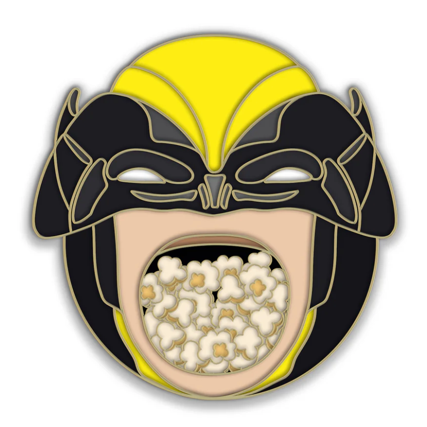 Collectible pin featuring a cartoon Deadpool face in a black and yellow mask emerging from a popcorn bucket.