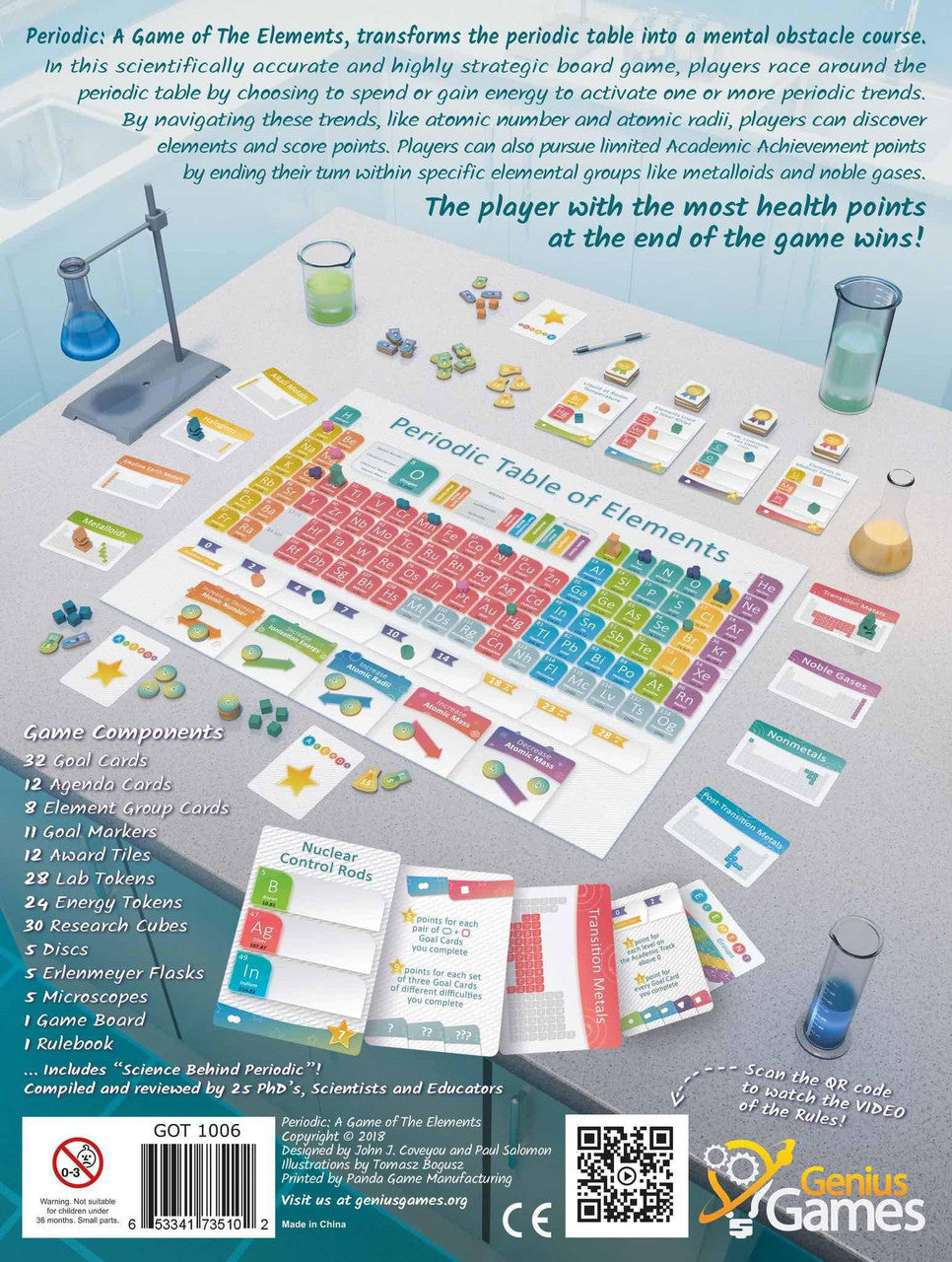 Periodic game components including colorful cards, tokens, and science pieces for educational chemistry gameplay.