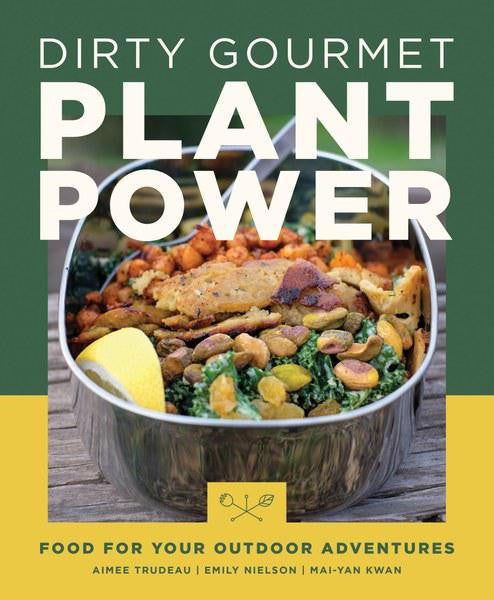 Dirty Gourmet Plant Power metal container with plant-based food on table.