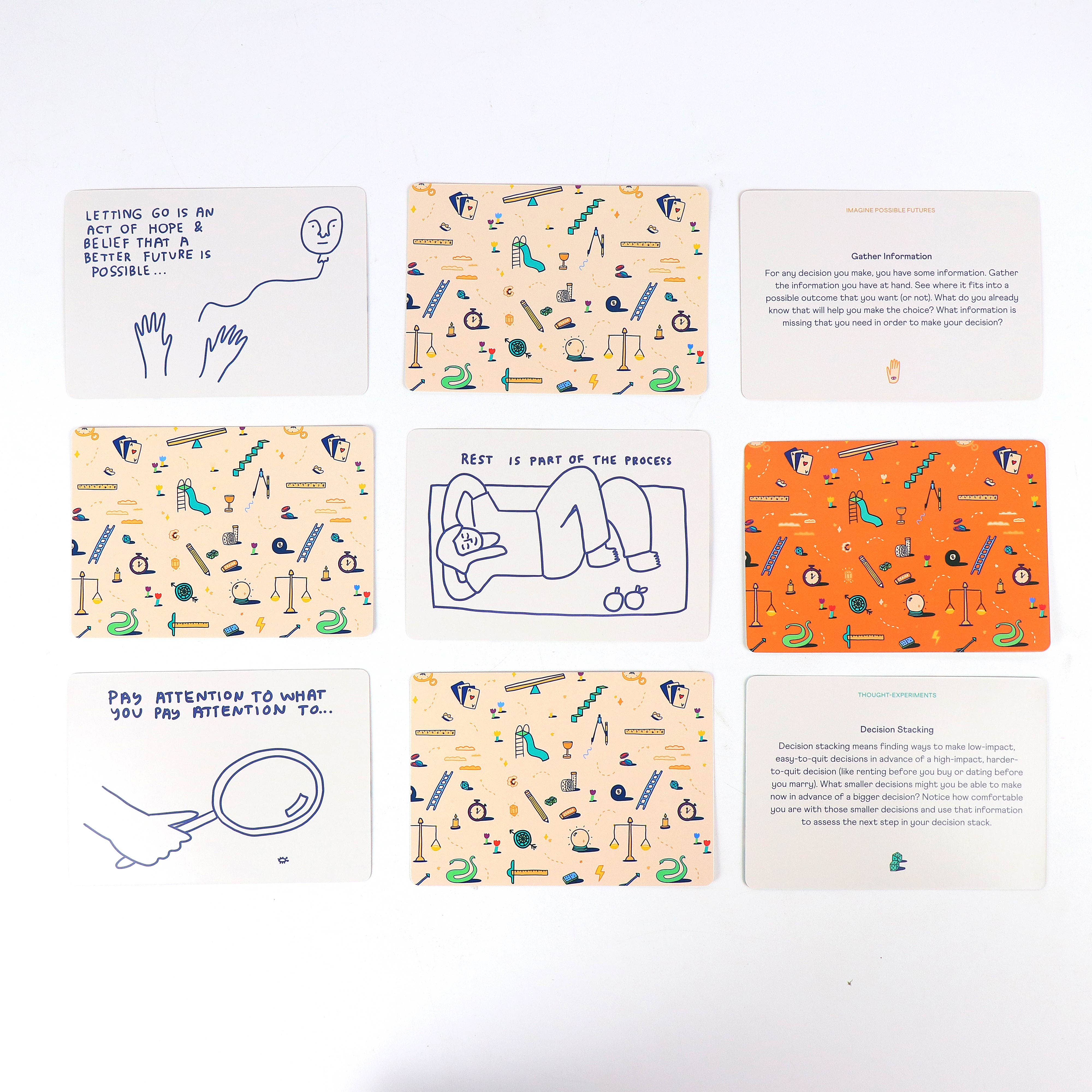 Nine cards from the How To Decide Deck arranged in a grid, each with an abstract pattern.
