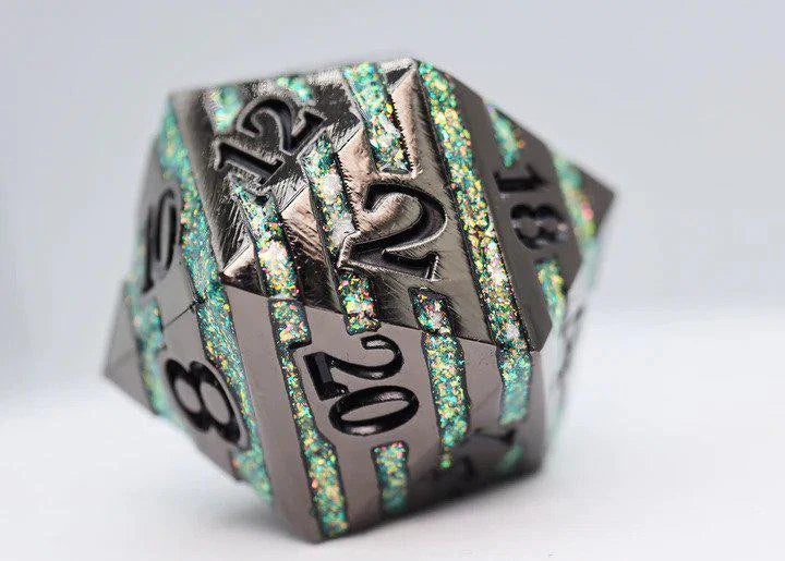 35mm Metal D20 die, black with green mica, green stripes, and black engraved numbers on each face.