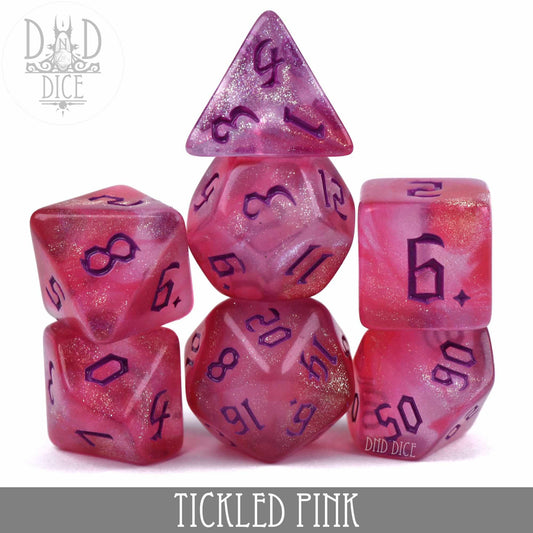Tickled Pink 7-piece acrylic dice set for DnD, pink glitter with purple numbers.
