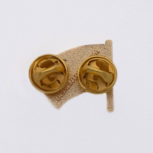 Nonbinary Flag Pin with two gold pin backs and textured gold finish on a white background.