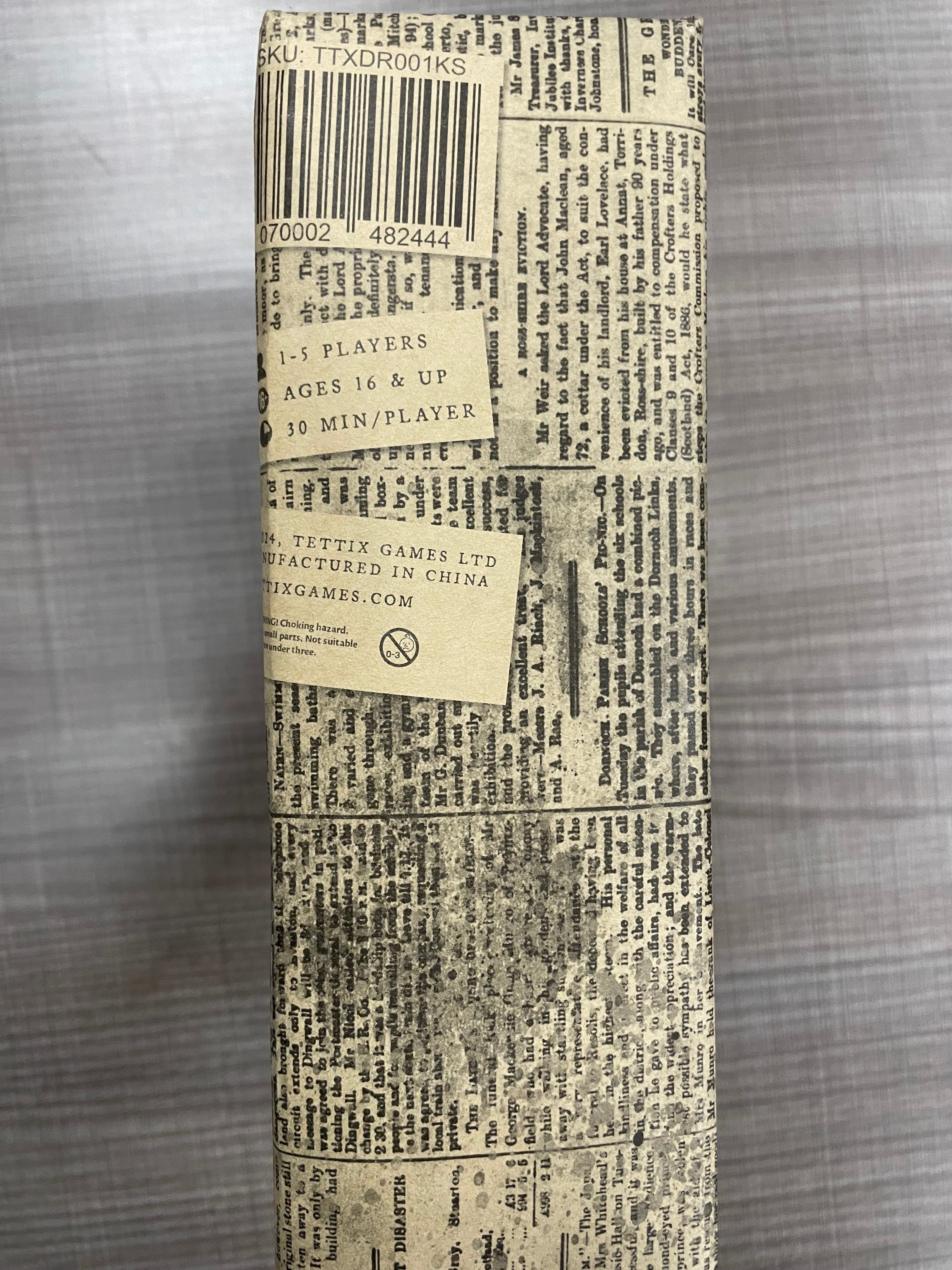 Deep Regrets KICKSTARTER EDITION game box with newspaper print, player info, and manufacturer details visible.