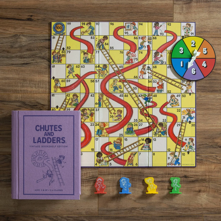 Chutes and Ladders Vintage Bookshelf Edition with board, spinner, game pieces, and purple rule book shown.