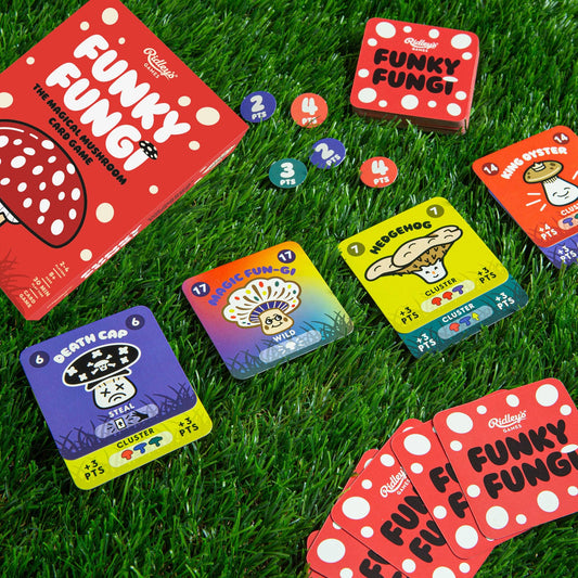Funky Fungi card game with cards and tokens arranged on a surface.