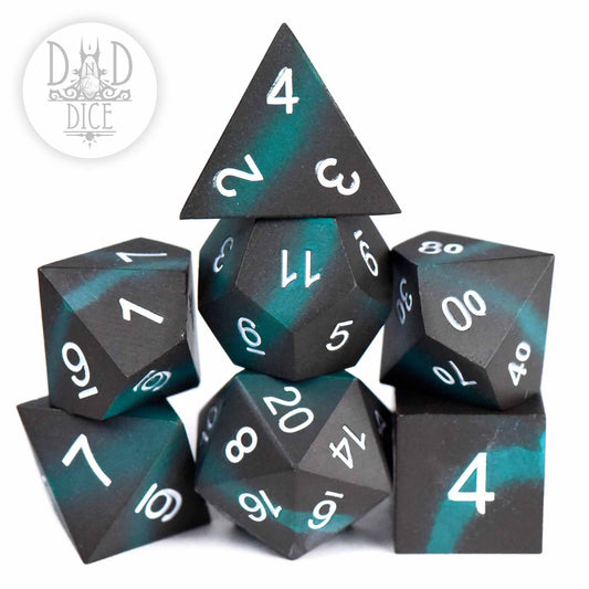 Tagging Teal (Metal) 7-piece DnD dice set, black and teal with white numbers.