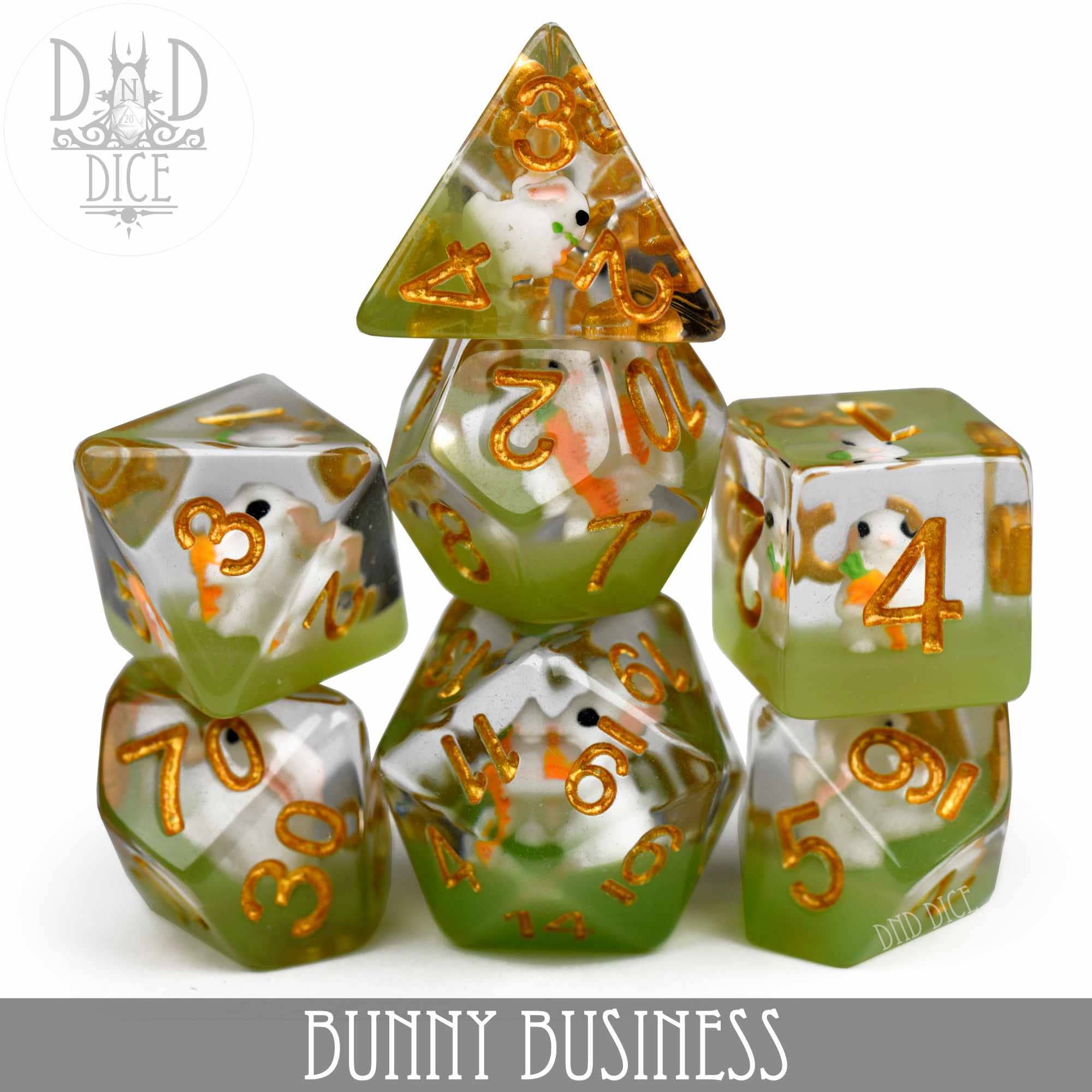 Bunny Business 7-piece green and clear resin dice set with bunny figures inside.