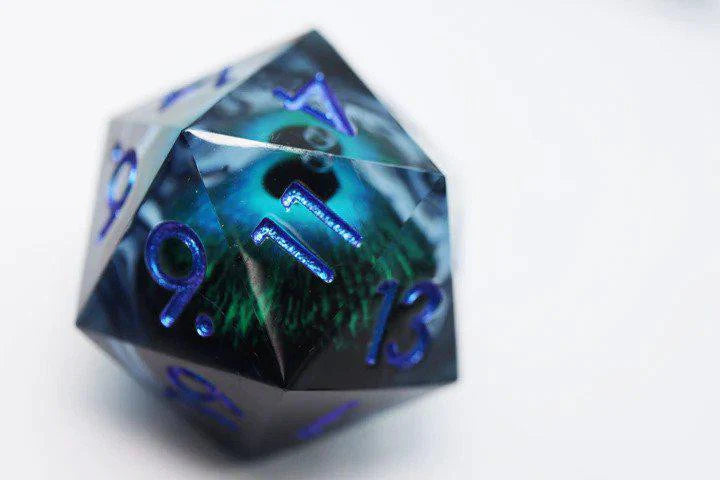 35mm Moving Eye D20 Blue Cyclops Eye die for tabletop games on a white surface.