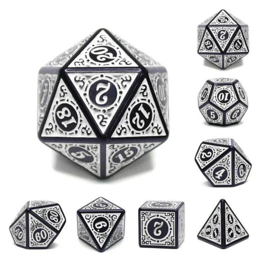 The Magic Flame - White RPG Dice Set with black and white ornate resin dice for tabletop RPGs like D&D.