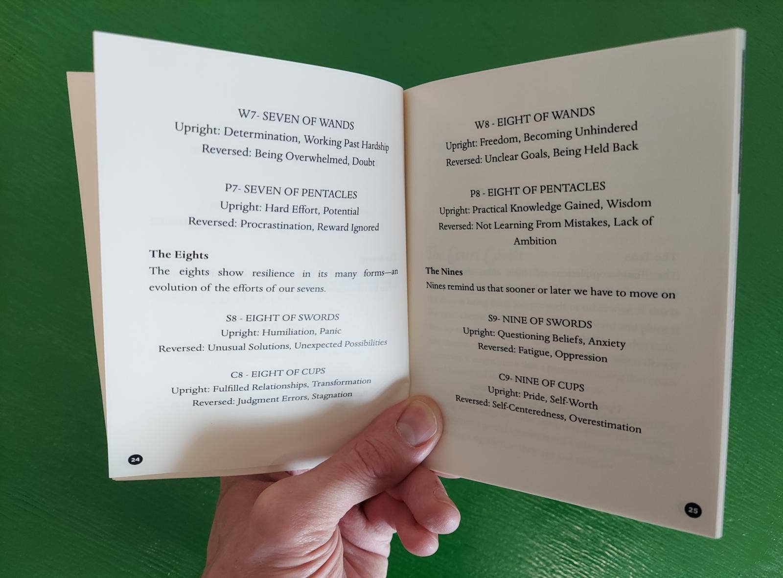 Pocket Guide to Tarot Card Archetypes (Zine) held open.