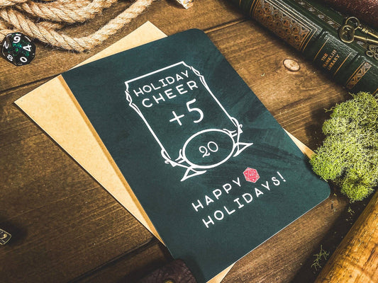 D&D Holiday Cheer +5 Card positioned with dice and rope.