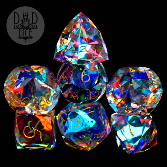 Gem Cut Prism Gift Box: set of 7 faceted dice, black with gold numbers, DnD Dice logo in the corner.