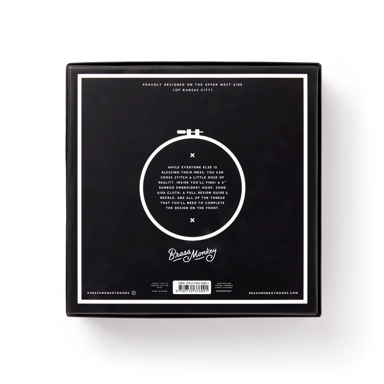 You Light Up A Room Cross Stitch Kit in black box with white text; Brass Monkey logo on back.