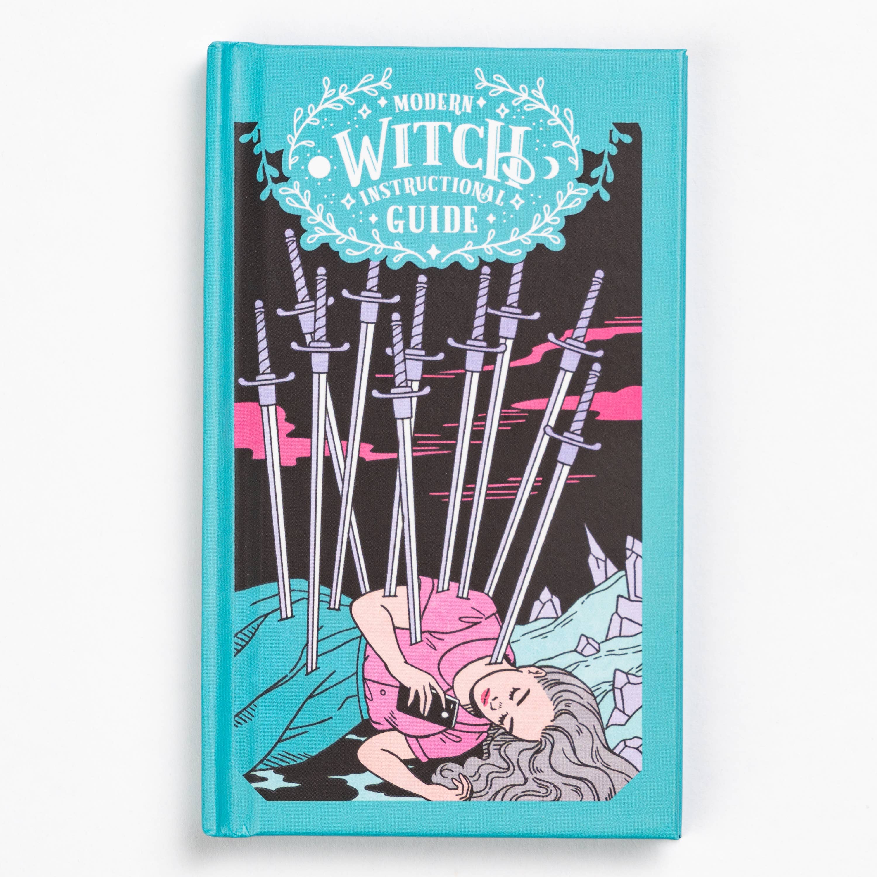 Modern Witch Tarot Deck with cover art showing a woman pierced by swords.