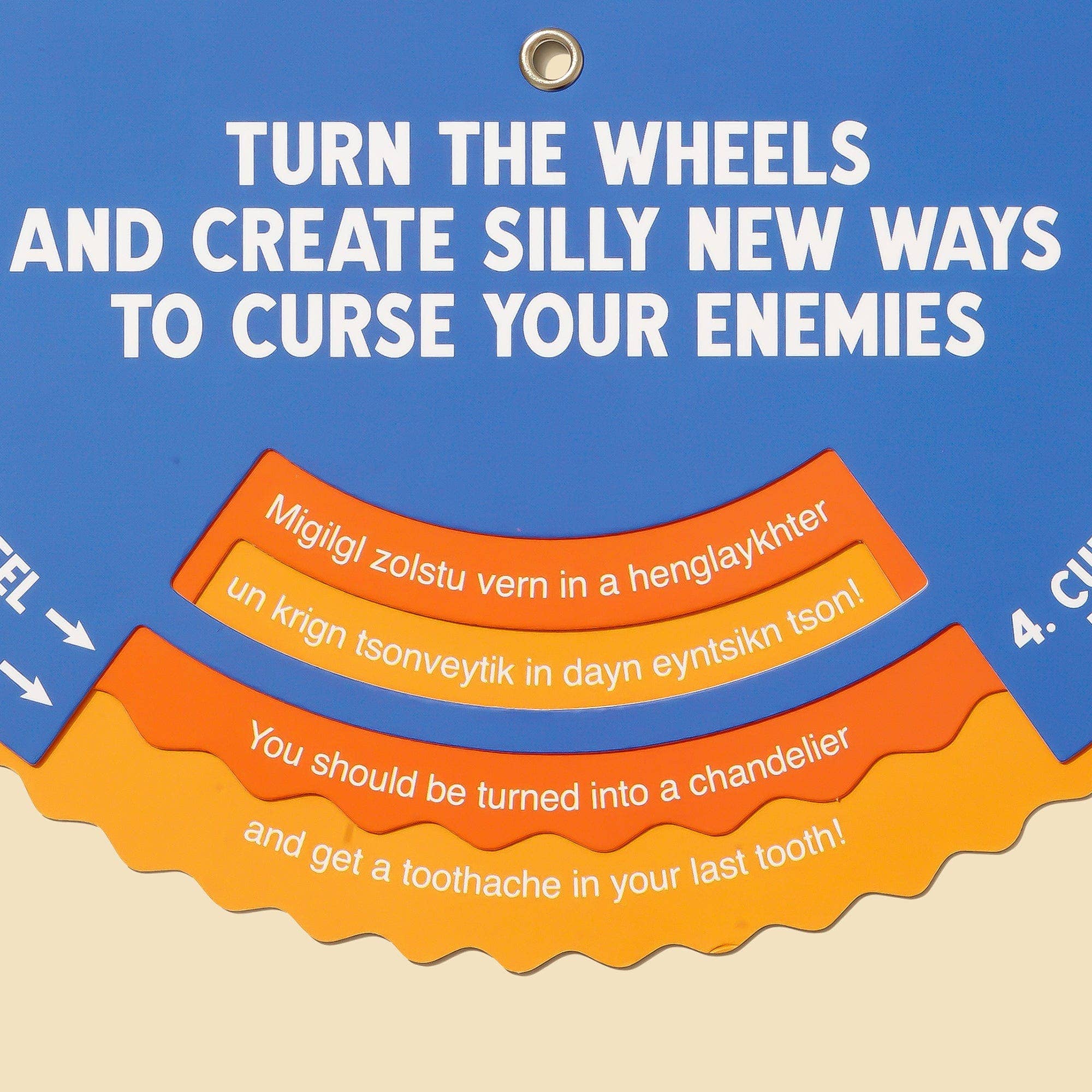 Yiddish Curse Generator wheel toy with printed phrases for traditional Yiddish curses.