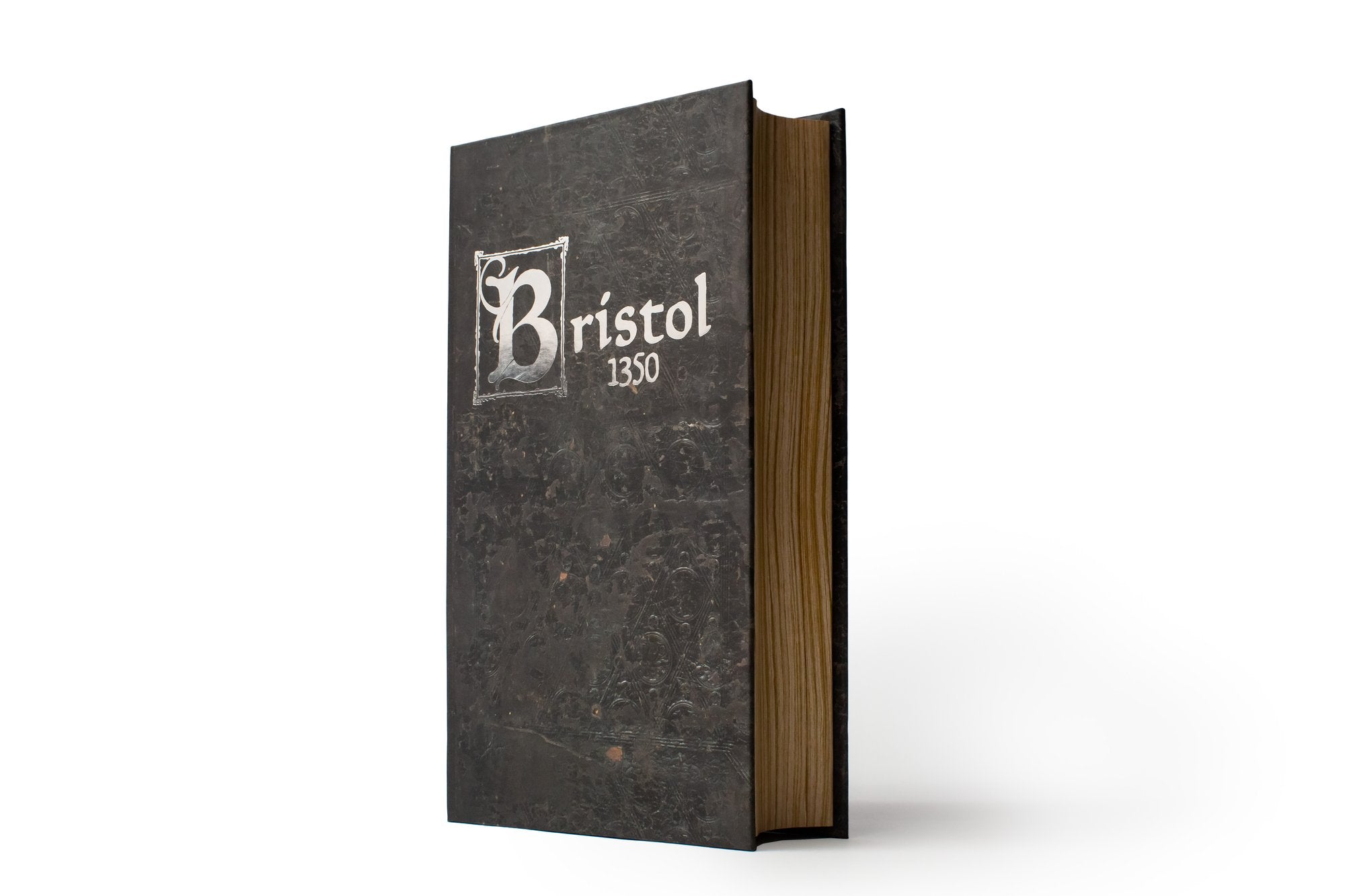 Bristol 1350 book with ornate cover standing upright.