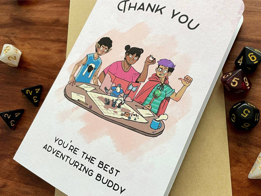 Thank You Adventuring Buddy Card: three friends gaming, text says Thanks, you’re the best adventuring buddy.