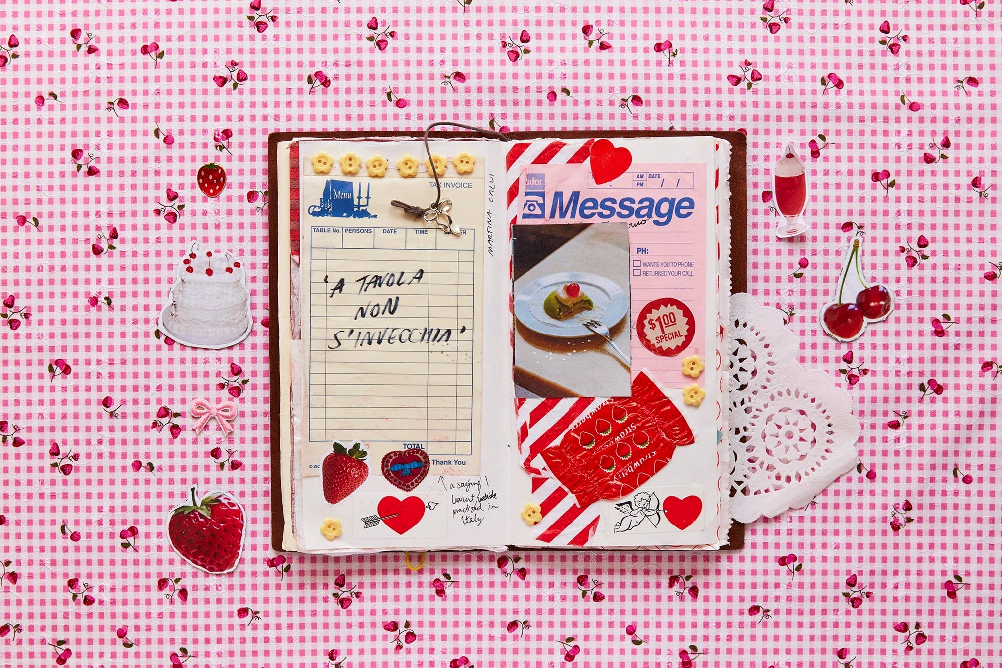 A Year of Junk Journaling book with notes, food images, and cherries on the cover.