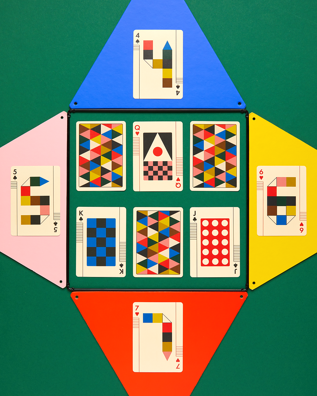 Eames The Little Toy playing cards with geometric and number designs.