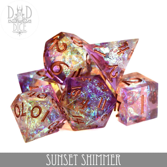 Sunset Shimmer (Handmade) purple and gold resin DND 7-dice set with orange numbers.