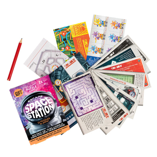 Escape from the Space Station intergalactic puzzle cards, red pencil, and mini escape game on white background.