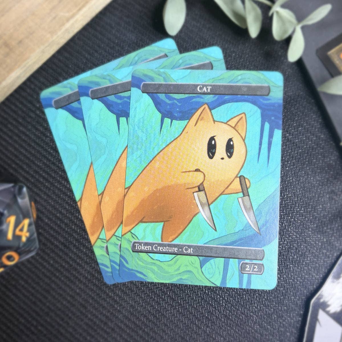 Rabbit & 2/2 Cat Token Set: Three trading cards with a cartoon orange cat in a green forest.