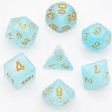 Cyan Silk Translucent Dice RPG Set with seven light blue polyhedral dice and gold numbers on a white surface.