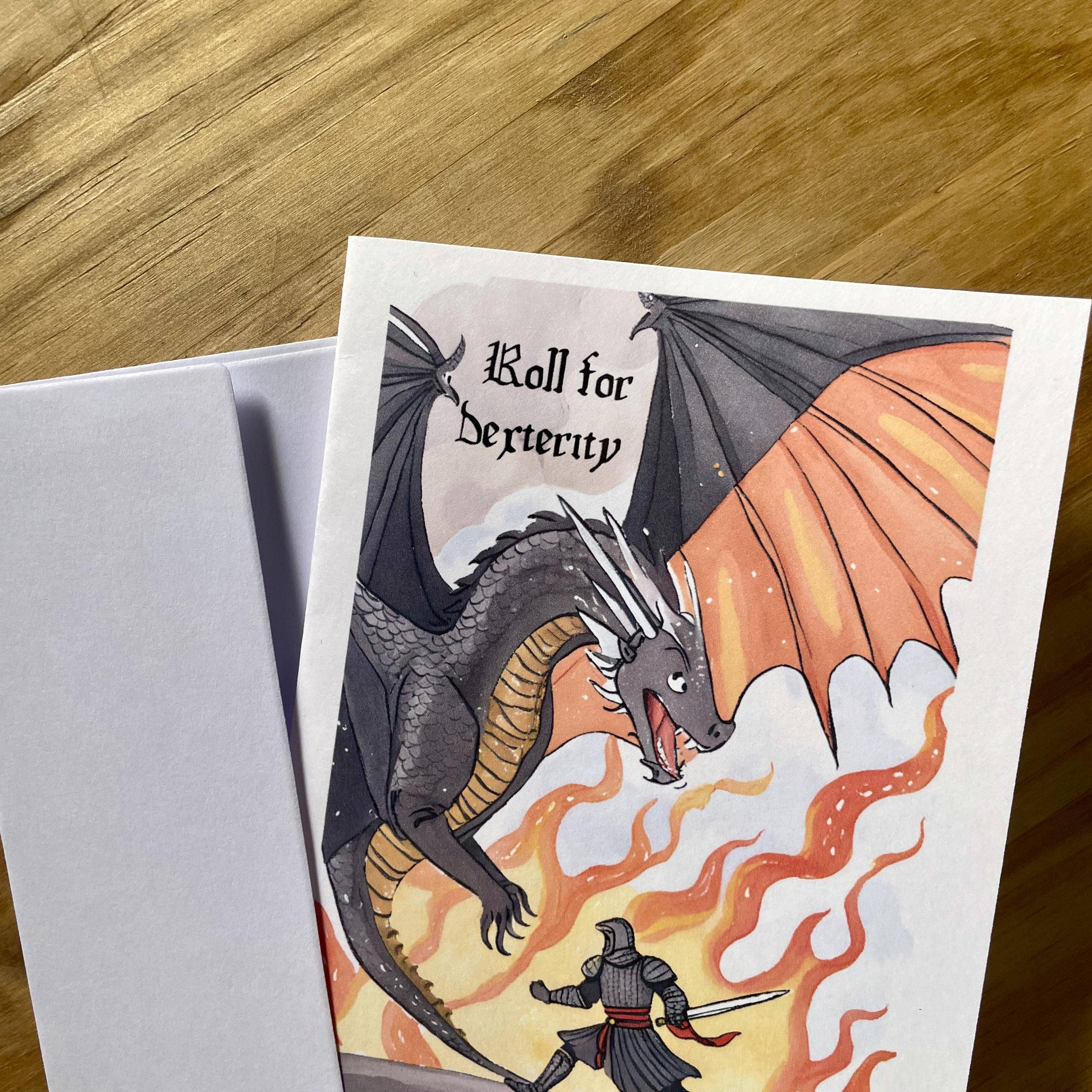 Matte encouragement card featuring a knight, fire-breathing dragon, and Roll for Dexterity text.
