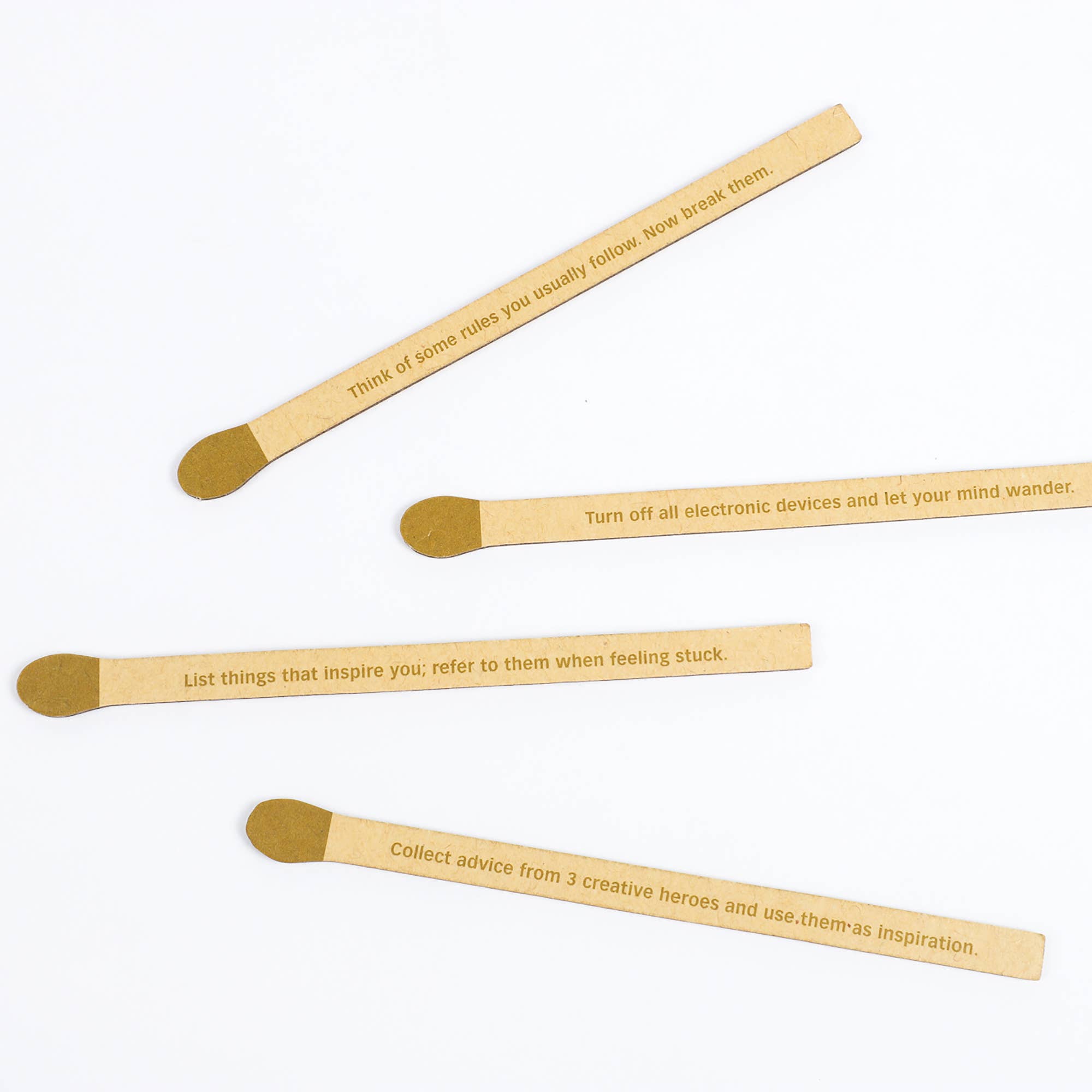 Spark Creativity sticks set displayed on white, each stick features a different creative prompt.
