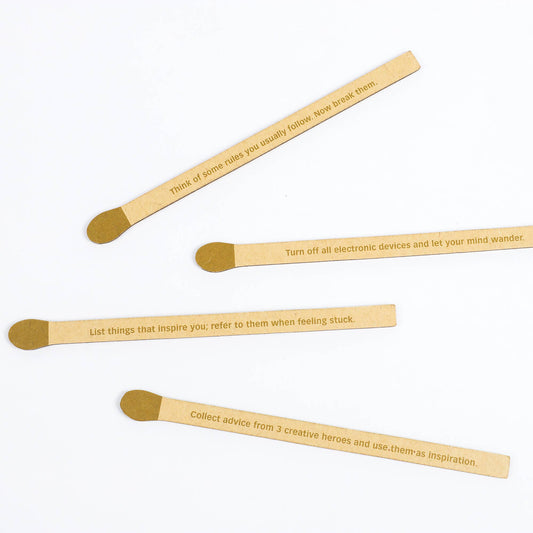 Spark Creativity sticks set displayed on white, each stick features a different creative prompt.