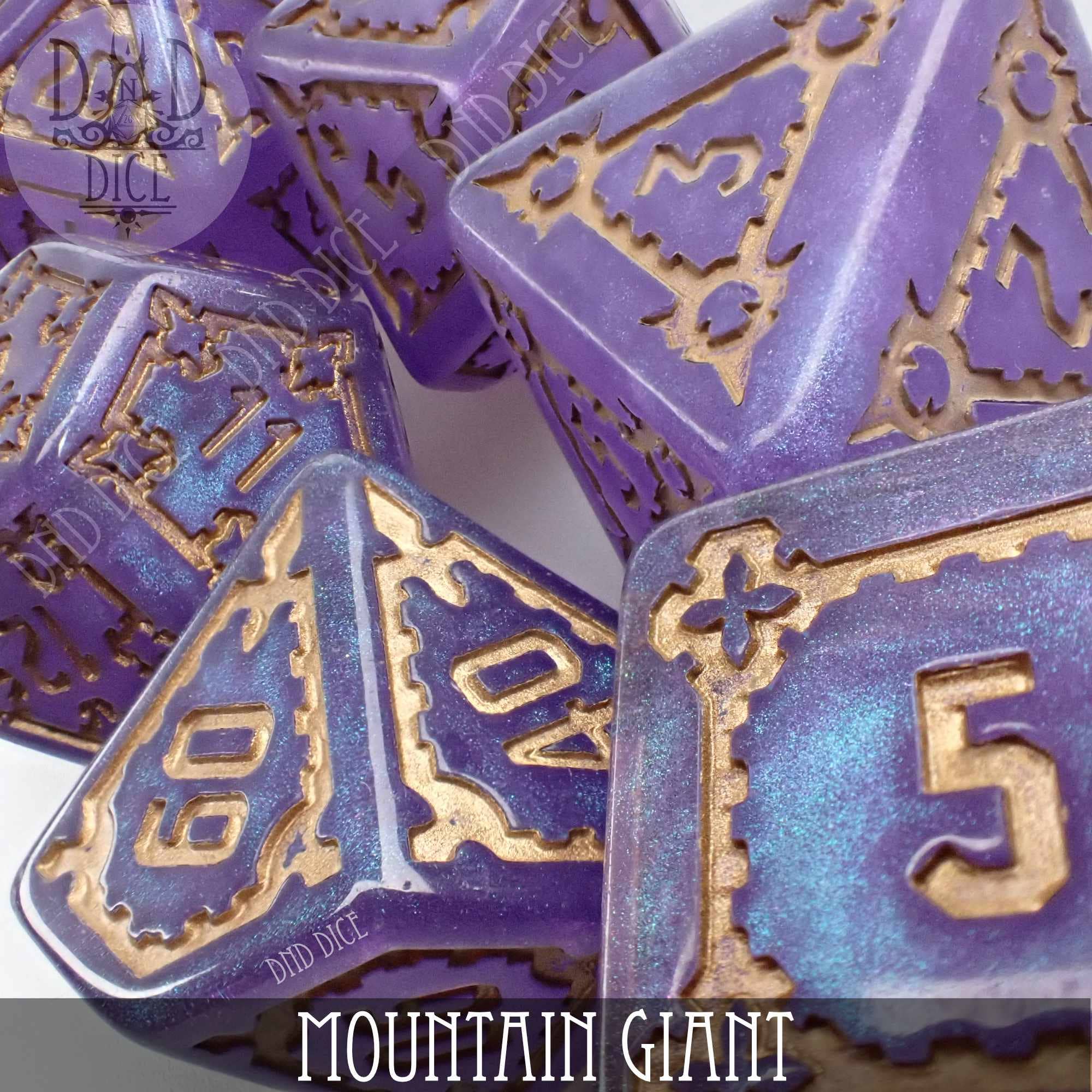 Mountain Giant sparkly purple oversized 7-dice set with gold numbers and designs, made from quality resin.