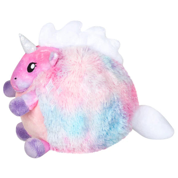 Pastel Cotton Candy Baby Unicorn Mini Squishable with white horn, fluffy mane and tail, and purple hooves, facing left.