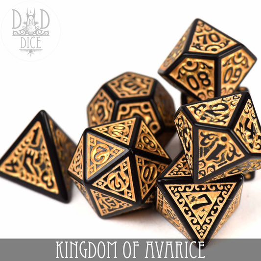 Kingdom of Avarice 7-piece black and gold acrylic dice set for tabletop gaming.