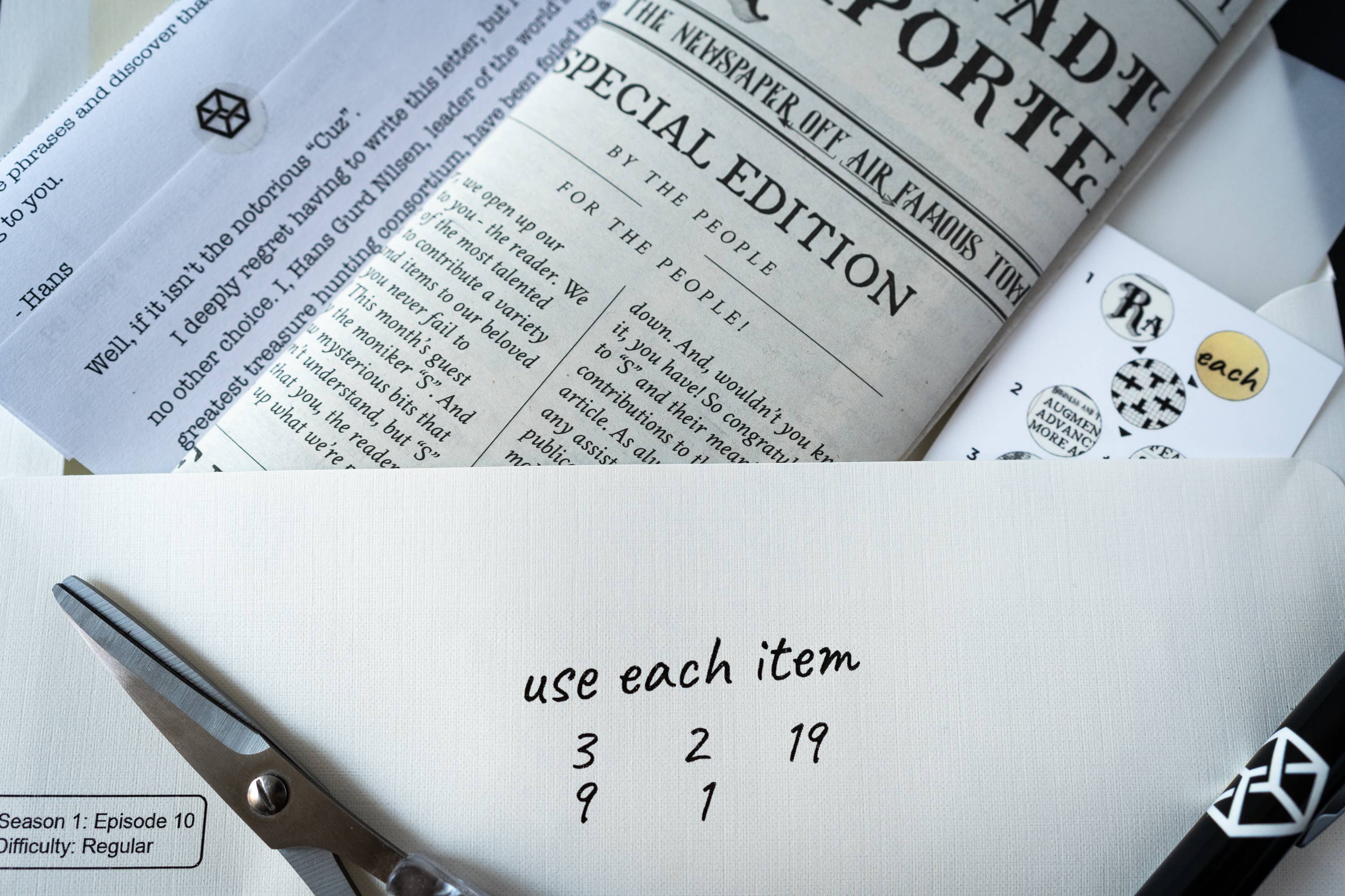 Family Secrets Series: Episode 10 - Revelations tabletop mystery game with newspaper, puzzle clues, and symbols set.