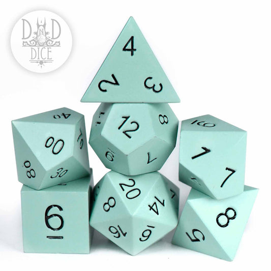 Synth Lab (Metal) mint green polyhedral 7-dice set with black numbers, stacked.