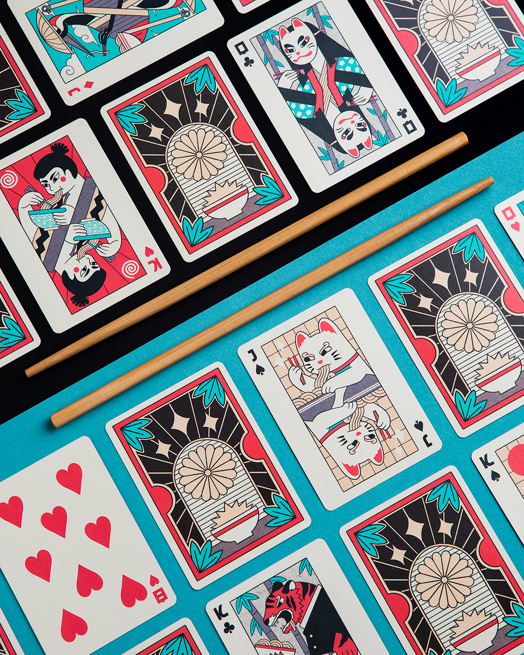 Ramen Heads playing cards with Japanese illustrations and wooden chopsticks.