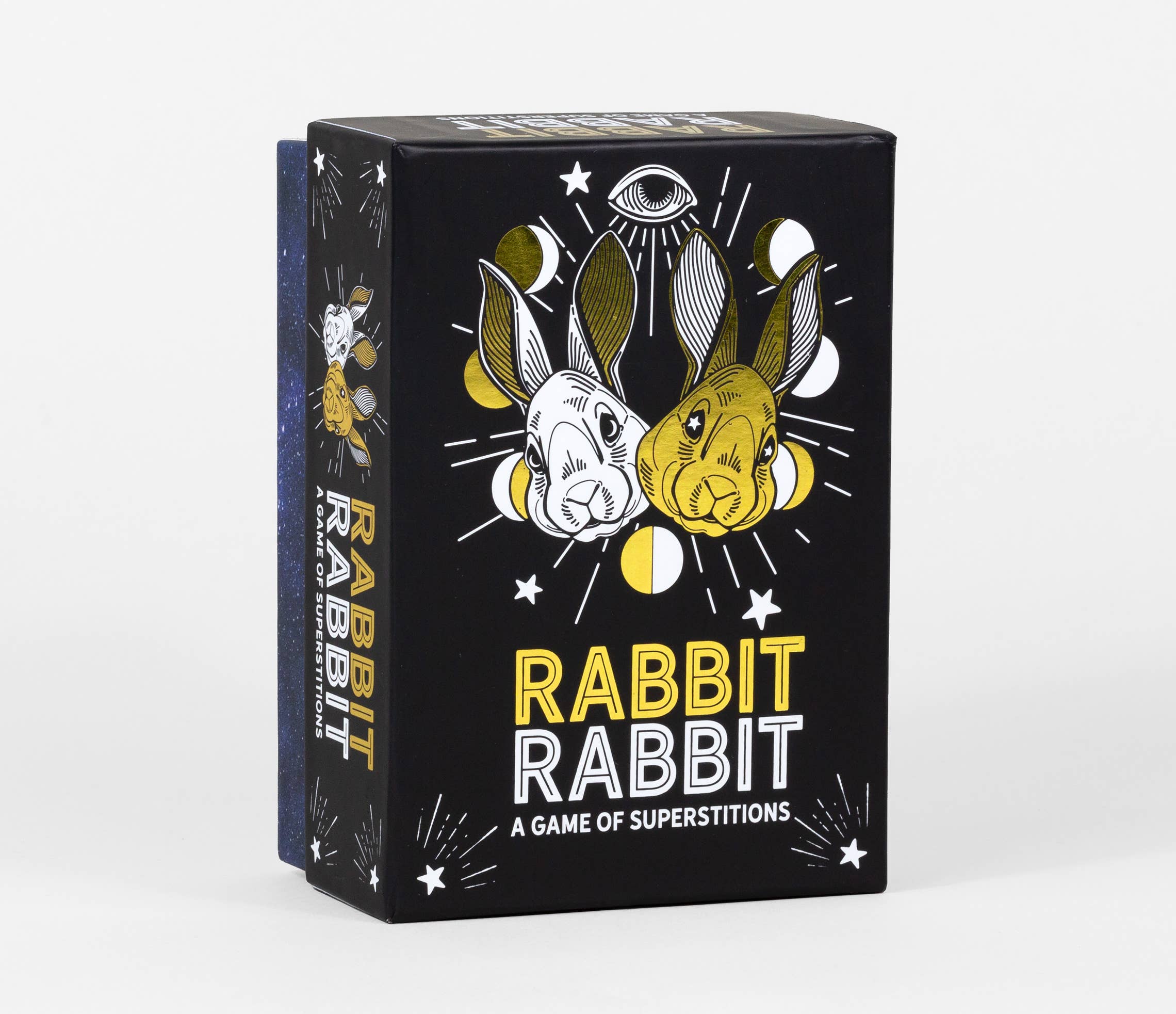 Rabbit Rabbit: A Game of Superstitions board game in a black box featuring two rabbits and an eye on the cover.