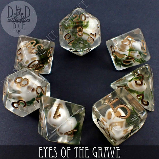 Eyes of the Grave 7-piece clear resin DnD dice set with small skulls embedded inside each die.